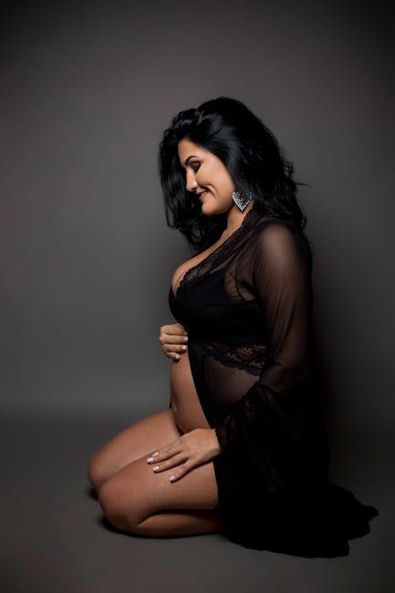 Maternity boudoir portrait with soft natural light