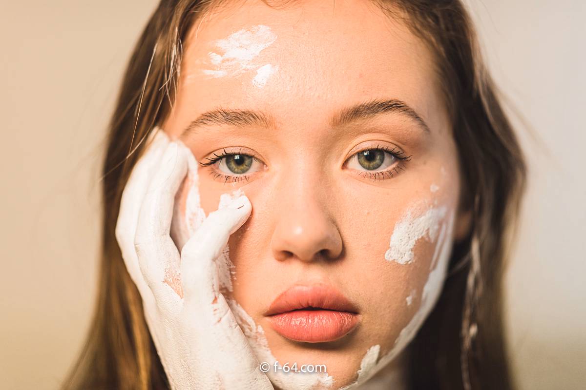 Boudoir photography with colorful body paint and glitter in Sacramento studio